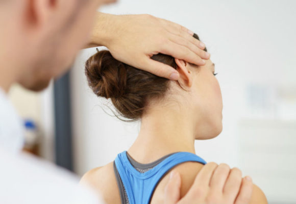 Male physical therapist with female patient.