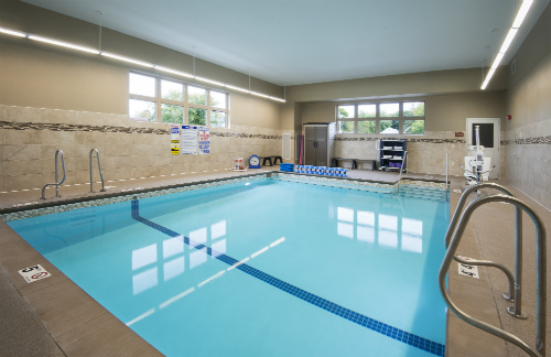 inside pool, clear blue water, tan walls, handicap accessible, Glacial Ridge Wellness Center, Glenwood, MN, open to the public