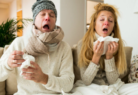 Man and woman with colds.