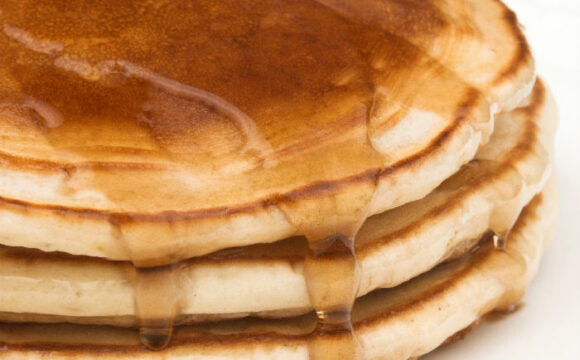stack of pancakes with maple syrup