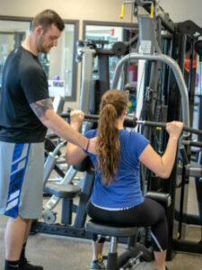 Man and woman working out.