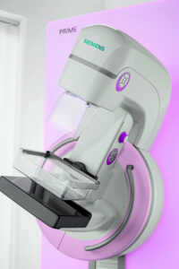 High-tech digital medical device, pink and white 3D mammography machine in white, sterile room