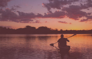 Kayaker on a lake.