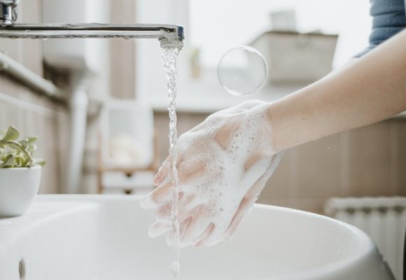 woman washing hands