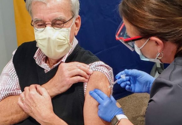 Man getting vaccine shot