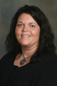 A professional picture of a woman, Occupational Therapist Tammy Vig