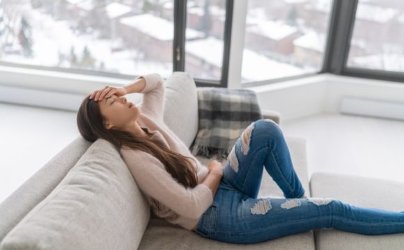 woman reclined on couch