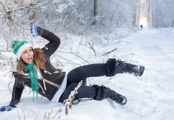 woman falling in snow