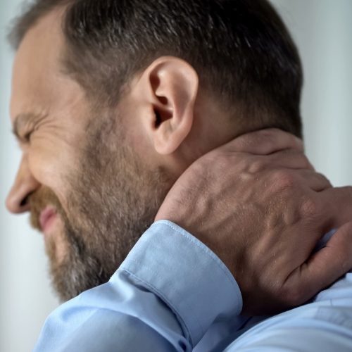 man and neck pain