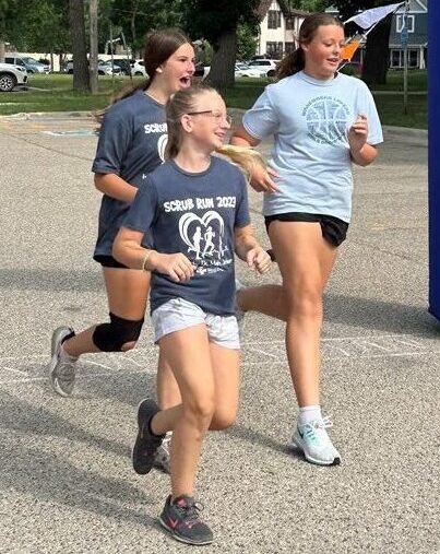 three girls running for sport