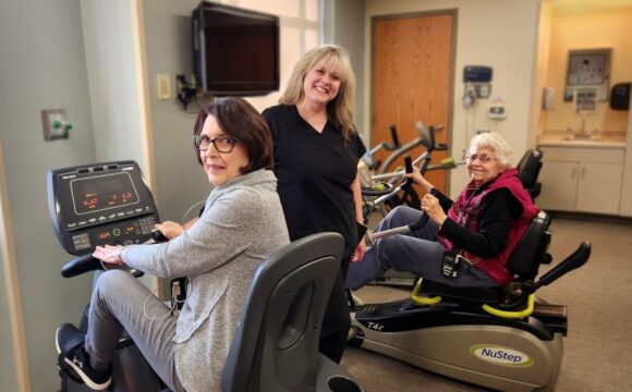 Three women at cardiac rehab gym