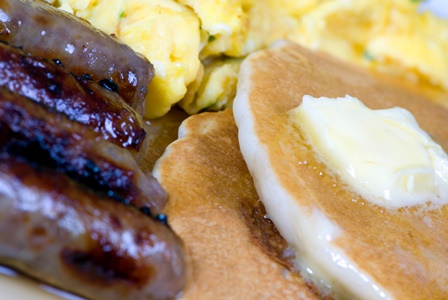 Pancakes, scrambled eggs, sausage links