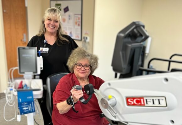 Woman using exercise equipment at pulmonary rehab at Glacial Ridge Health System