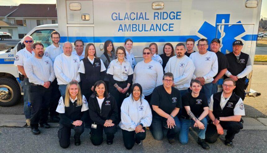 Glacial Ridge Ambulance Staff in front of ambulance
