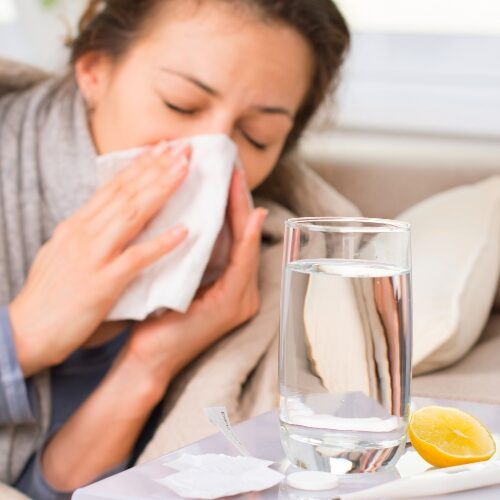 Sick Woman with Cold or Flu Symptoms