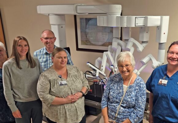 da Vinci robot with group of adults