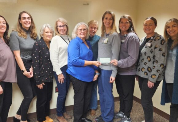 auxiliary gives donation for hospital project
