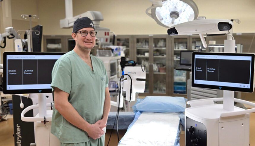 Dr .Thomas and the VELYS Robotic Assisted Knee Replacement Orthopedic Surgeon Dr . Joshua Thomas with the advanced VELYS Robotic Assisted Knee Replacement System at Glacial Ridge Center for Surgical Care in Glenwood, MN.