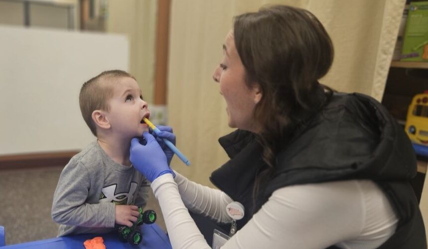 Brianna Hennen speech therapy oral stimulation with child