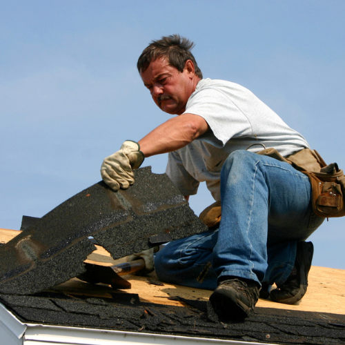 Man working on roof Man working on roof
