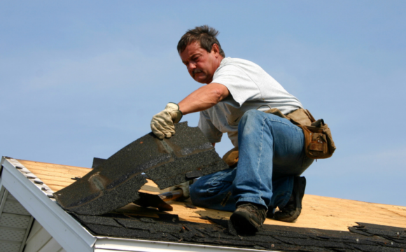Man working on roof