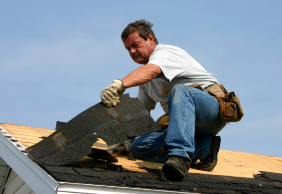 Man working on roof