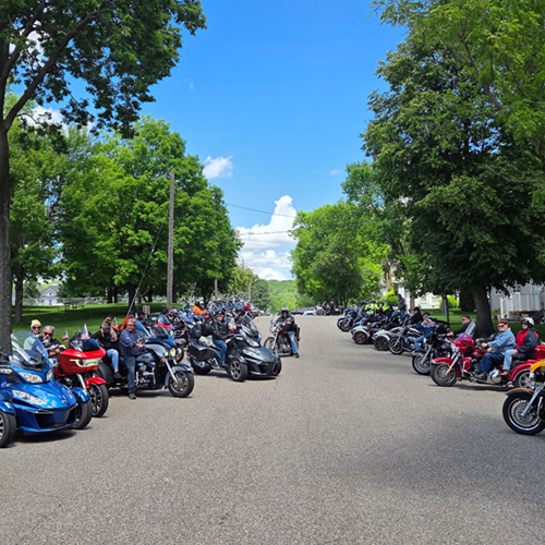 motorcycles lining a street