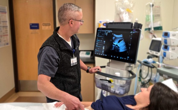 Dan Gerwing, PA, Glacial Ridge Hospital ED, using equipment