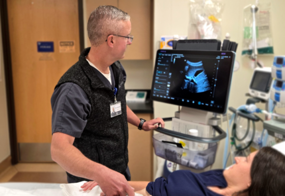 Dan Gerwing, PA, Glacial Ridge Hospital ED, using equipment