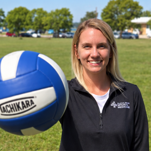 woman holding volleyball